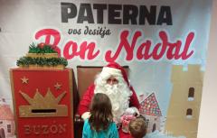 Papà Noel visita als xiquets i xiquetes en tots els barris de Paterna
